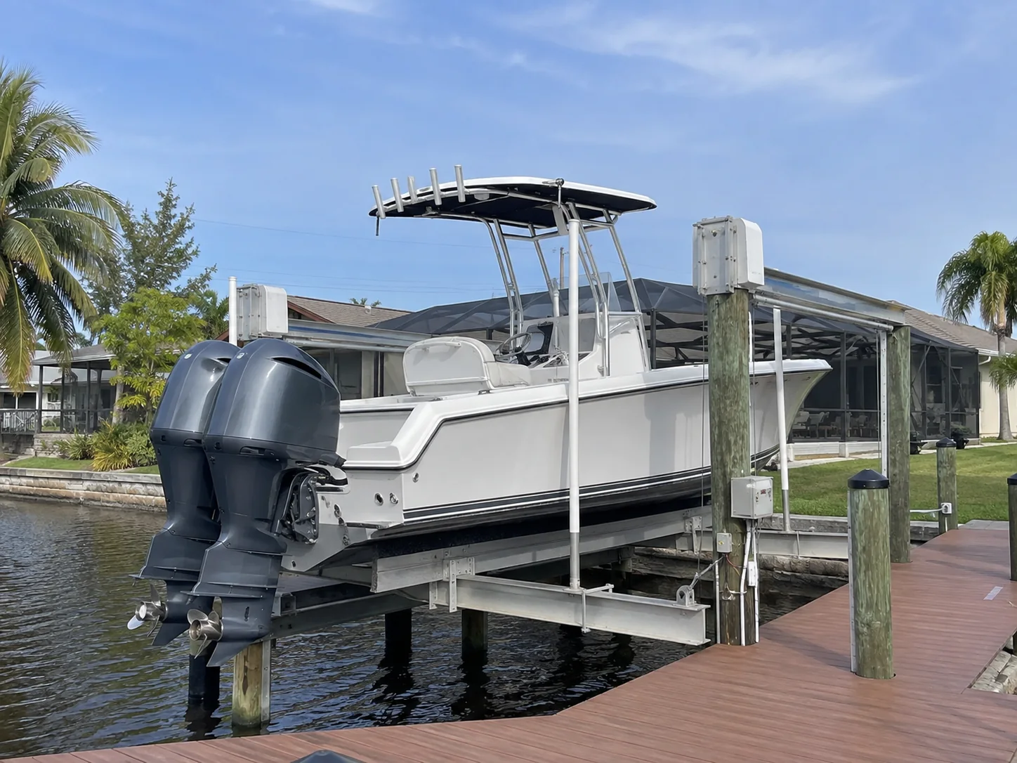 Boat lift and canal access at a Cape Coral waterfront home